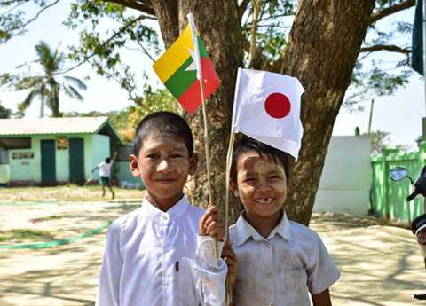 Myanmar Children Holding Japan Flag